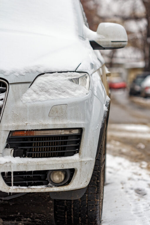 White SUV on a street