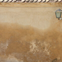 Weathered wall with a lamp