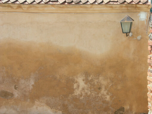 Weathered wall with a lamp