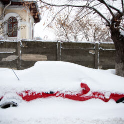 red car under snow