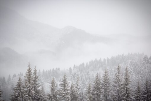 Snow capped mountains in a blizzard