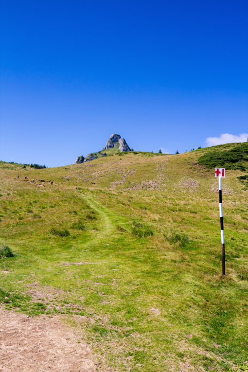 People climbing along a hiking trail