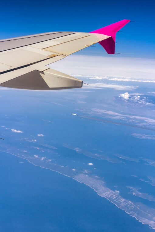 Wing of an airplane in flight taken from window