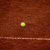 Tennis ball on court